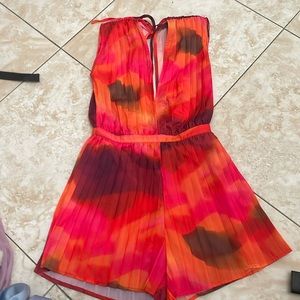 Colorful beautiful romper with open back and low cut very gorgeous for summer